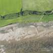 Oblique aerial view of the pier and the fish traps, looking S.