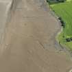 Oblique aerial view of the remains of the  fish traps, looking NNE.