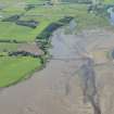 Oblique aerial view of River Conon centred on the remains of the fish trap, looking SW.