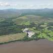 General oblique aerial view with Ardchronie Quarry in the foreground, looking SW.