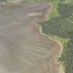 Oblique aerial view centred on the possible fish trap, looking N