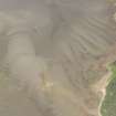 Oblique aerial view centred on the possible fish trap, looking NNW.