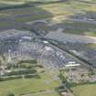 Oblique aerial view of Edinburgh Airport and Edinburgh Tramway, looking N.