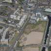 General oblique aerial view of Fountainbridge, Union Canal, Lochrin Basin and Edinburgh Quay, looking NE.