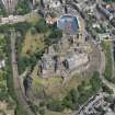 Oblique aerial view of Edinburgh Castle and Esplanade, looking E.