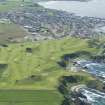 Oblique aerial view of the Royal Tarlair Golf Course with Macduff beyond, looking WSW.