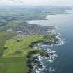 General oblique aerial view of the Royal Tarlair Golf Course with Macduff beyond, looking WSW.