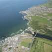 General oblique aerial view centred on Banff Bridge with Banff in the foreground and MacDuff beyond, looking ENE.