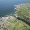 General oblique aerial view centred on Banff Bridge with Banff in the foreground and MacDuff beyond, looking NE.