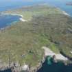 General oblique aerial view of Iona with Port na Curaich in the foreground, looking NNE.