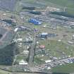 Oblique aerial view of T in the Park centred on the Main Stage with King Tuts Wah Wah Tent beyond, looking SSE.