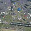 Oblique aerial view of T in the Park centred on the Main Stage with King Tuts Wah Wah Tent beyond, looking ESE.