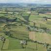 General oblique aerial view of Midlem village and the surrounding field pattern, looking NNW.