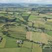 General oblique aerial view of Midlem village and the surrounding field pattern, looking NNW.