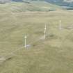 Oblique aerial view of the W end of Green Knowes Wind Farm, looking NNW.