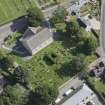 Oblique aerial view of Chapel of Garioch Parish Church, St Mary's Chapel and Old Parish Church, looking NE.