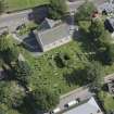 Oblique aerial view of Chapel of Garioch Parish Church, St Mary's Chapel and Old Parish Church, looking NNE.