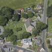 Oblique aerial view of Chapel of Garioch Parish Church, St Mary's Chapel and Old Parish Church, looking WNW.