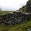 View of outbuilding of drystone slate construction from north