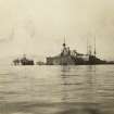 Uncaptioned photograph of ships. Possibly British ships HMS Mars, HMS Fearless and HMS King George V