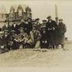 Uncaptioned photograph of a group of people in front of John O'Groats House Hotel.