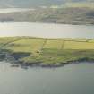 Oblique aerial view of Munger Skerries, Ness of Sound, looking SW.