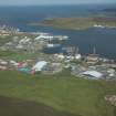 General oblique aerial view of Gremista and Lerwick North Harbour, looking NE.