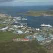 General oblique aerial view of Gremista and Lerwick North Harbour, looking NE.
