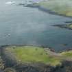 General oblique aerial view of Utstabi and the Stenness Fishing station, looking NW.