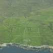 Oblique aerial view of Mel and New Virse, Unst, looking W.