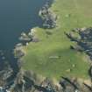 Oblique aerial view of Horns of The Garths, Skaw, Unst, looking WSW.
