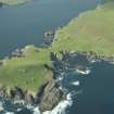 Oblique aerial view of Horns of The Garths, Skaw, Unst, looking W.