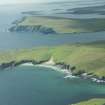 Oblique aerial view of The Garths, Unst, looking SSW.