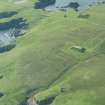 Oblique aerial view of The Garths, Unst, looking SE.