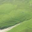 Oblique aerial view of Inner Skaw and The Garths, Unst, looking SE.