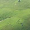 Oblique aerial view of Inner Skaw and The Garths, Unst, looking SE.
