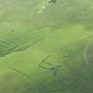 Oblique aerial view of Inner Skaw and The Garths, Unst, looking SE.