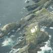 Oblique aerial view of North Unst Lighthouse, Muckle Flugga, looking S.