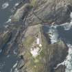 Oblique aerial view of North Unst Lighthouse, Muckle Flugga, looking SSW.