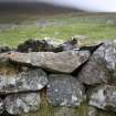 Blackhouse F, detail of re-used zinc sheeting in wallhead.