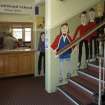 INterior Ferguson Building. Detail of stair and school office on ground floor from east. Mural starts with the Gala Queen.