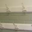 Interior, Ferguson Building. Detail of coat hooks.