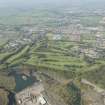 Oblique aerial view of Cochrane Castle Golf Course, looking W.