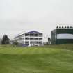 Temporary buildings (Sky tv studio and Argyll Pavilion) on the north west side of the first fairway taken from the 1st tee looking south west.