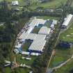 Oblique aerial view of The PGA Golf Course Spectator Village, looking ESE.