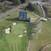 Oblique aerial view of the 8th green of the 2014 Ryder Cup PGA Centenary Golf Course, looking E.