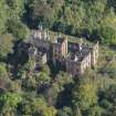 Oblique aerial view of Lennox Castle, looking ENE.