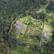 Oblique aerial view of Drummond Castle and formal garden, looking NE.
