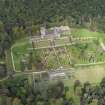 Oblique aerial view of Drummond Castle and formal garden, looking NNW.