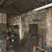Ground floor, interior view of Brass Shop (or small castings department). This area of the foundry dates from the 1940s. Note the original external wall and window which now forms the dividing wall with the rest of the foundry